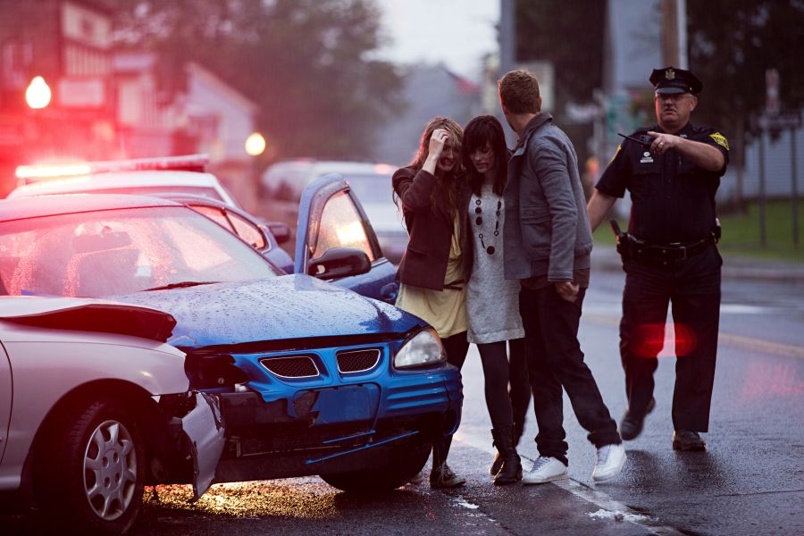 Drivers assessing damage after a Lyft driver collision in Gilbert
