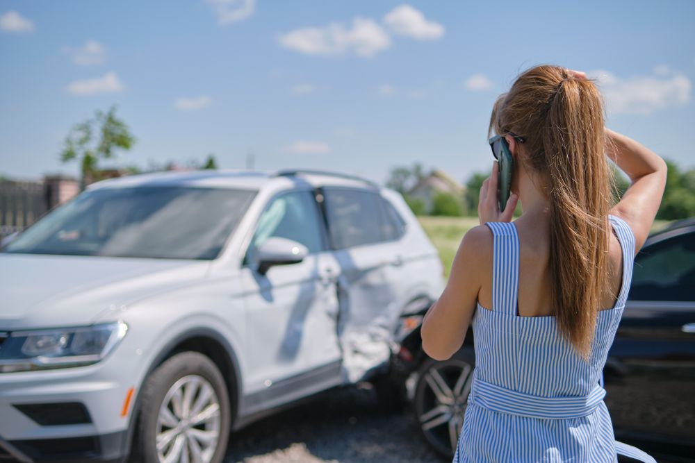 Woman calling for help after a car accident in Gilbert, Arizona